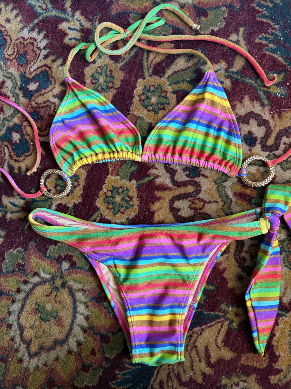 Triya brazilian bikini Rainbow Striped Bikini Set with gold rings.